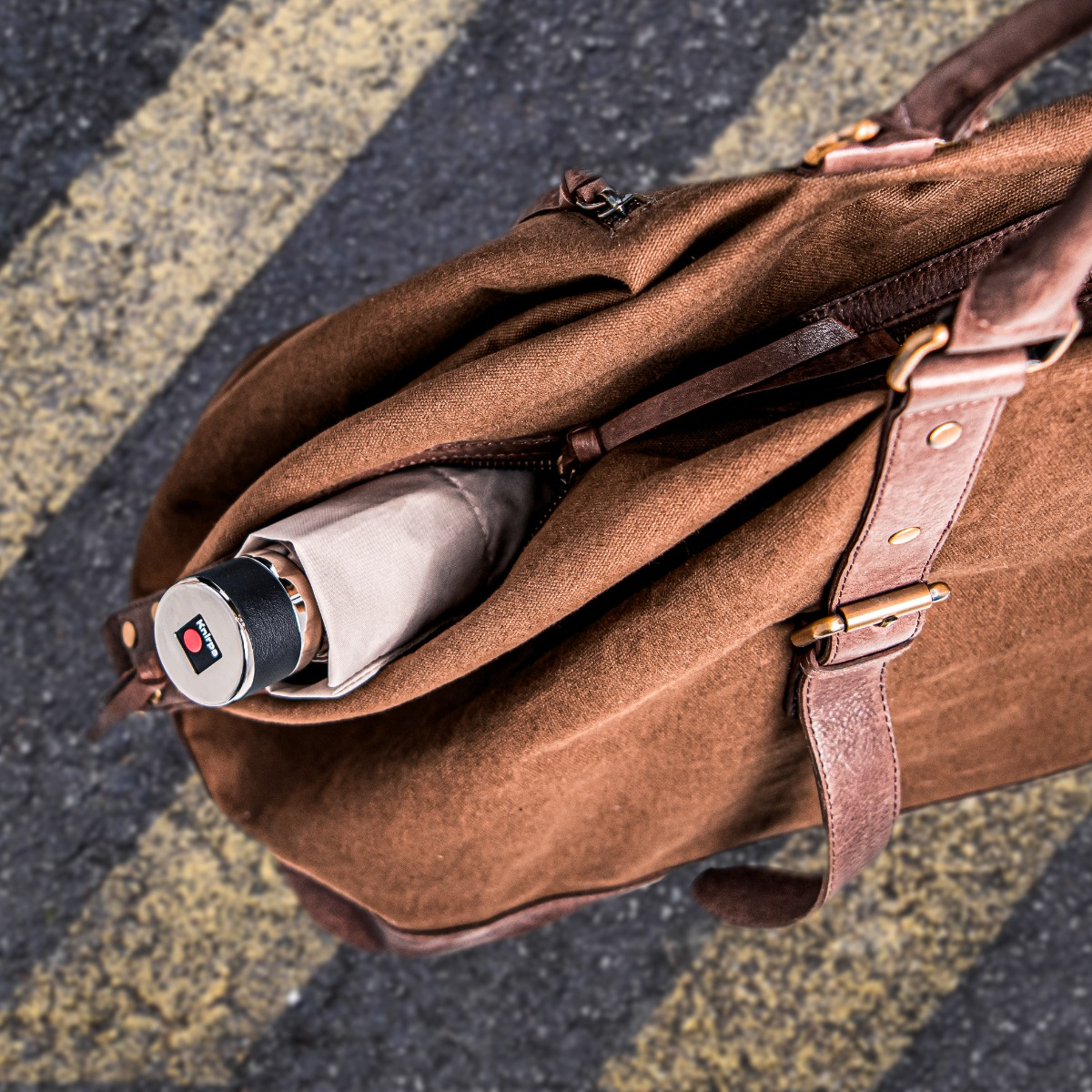 Knirps umbrella in leather bag Knirps umbrella in leather bag